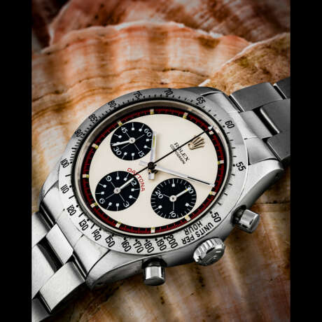 ROLEX. A RARE STAINLESS STEEL CHRONOGRAPH WRISTWATCH WITH BRACELET AND “PAUL NEWMAN” DIAL - photo 1