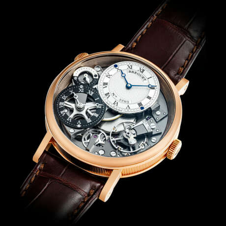 BREGUET. AN 18K PINK GOLD SEMI-SKELETONISED DUAL TIME WRISTWATCH WITH DAY/NIGHT INDICATION - фото 2