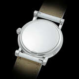 PATEK PHILIPPE. A LADY’S 18K WHITE GOLD AND DIAMOND-SET WRISTWATCH WITH MOON PHASES - photo 2
