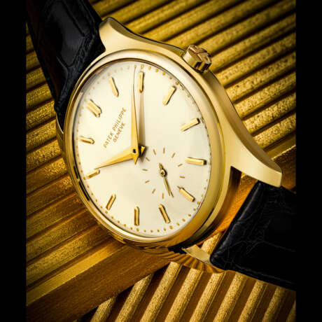 PATEK PHILIPPE. A RARE 18K GOLD AUTOMATIC WRISTWATCH WITH ENAMEL DIAL - Foto 1