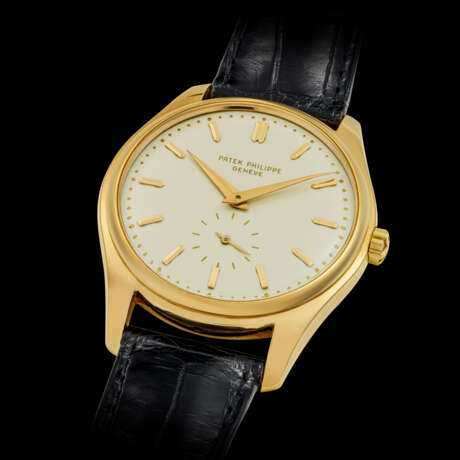 PATEK PHILIPPE. A RARE 18K GOLD AUTOMATIC WRISTWATCH WITH ENAMEL DIAL - photo 2