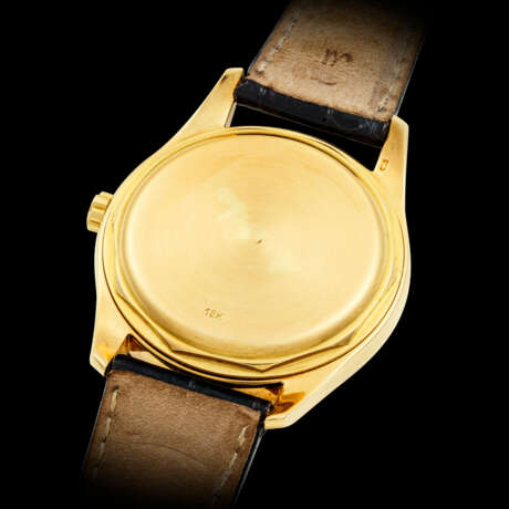 PATEK PHILIPPE. A RARE 18K GOLD AUTOMATIC WRISTWATCH WITH ENAMEL DIAL - photo 3