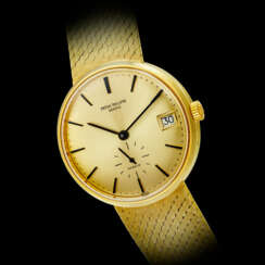 PATEK PHILIPPE. AN 18K GOLD AUTOMATIC BRACELET WATCH WITH DATE, RETAILED BY G&#220;BELIN