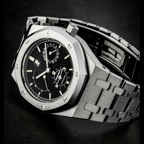 AUDEMARS PIGUET. A STAINLESS STEEL AUTOMATIC DUAL TIME WRISTWATCH WITH POWER RESERVE AND DATE - фото 1