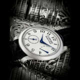 F. P. JOURNE. A PLATINUM WRISTWATCH WITH POWER RESERVE - фото 1