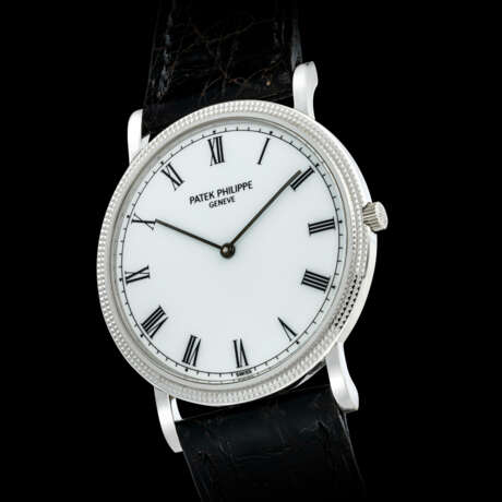 PATEK PHILIPPE. AN 18K WHITE GOLD ULTRA-SLIM WRISTWATCH - фото 1