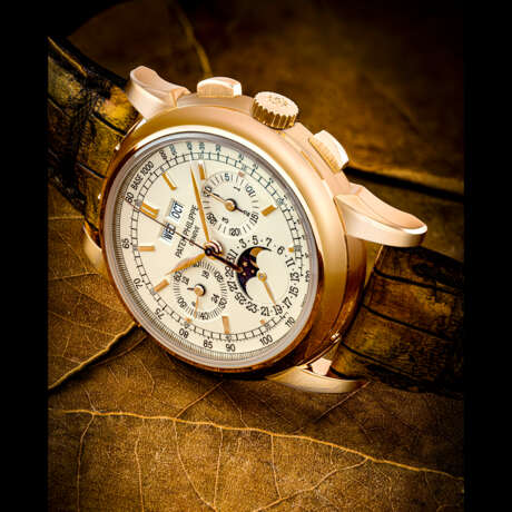 PATEK PHILIPPE. A RARE 18K PINK GOLD PERPETUAL CALENDAR CHRONOGRAPH WRISTWATCH WITH MOON PHASES, 24 HOUR AND LEAP YEAR INDICATION - photo 1