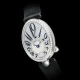 BREGUET. A LADY’S 18K WHITE GOLD AND DIAMOND-SET AUTOMATIC WRISTWATCH WITH MOTHER-OF-PEARL DIAL - Foto 1