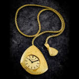 PATEK PHILIPPE. AN 18K GOLD ASYMMETRICAL POCKET WATCH WITH FITTED CHAIN - photo 1