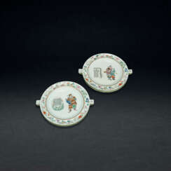 TWO RARE INSCRIBED FAMILLE ROSE &#39;NARRATIVE&#39; WARMING PLATES