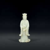 A PALE GREENISH-WHITE JADE CARVING OF A BODHISATTVA - фото 1