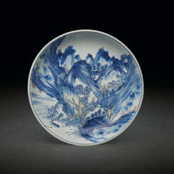 A RARE LARGE UNDERGLAZE-BLUE AND COPPER-RED-DECORATED &#39;MASTER OF THE ROCKS’ DISH