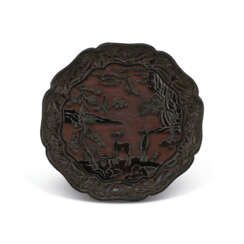 A CARVED BLACK AND RED LACQUER FOLIATE TRAY