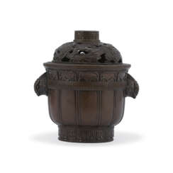 A BRONZE CYLINDRICAL CENSER AND RETICULATED COVER