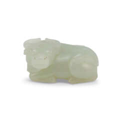 A SMALL WHITE JADE CARVING OF A BUFFALO