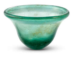 A MEROVINGIAN GREEN GLASS PALM CUP