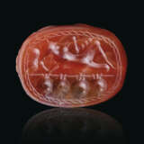 AN ETRUSCAN CARNELIAN SCARAB WITH HERCLE ON A RAFT - фото 1