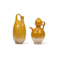 AN AMBER-GLAZED FLASK AND AN AMBER-GLAZED DOUBLE GOURD-FORM EWER