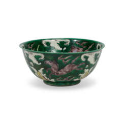 A GREEN, YELLOW, CREAM AND AUBERGINE-GLAZED BISCUIT BOWL