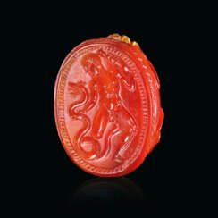 AN ETRUSCAN CARNELIAN SCARAB WITH HERCLE AND SERPENT