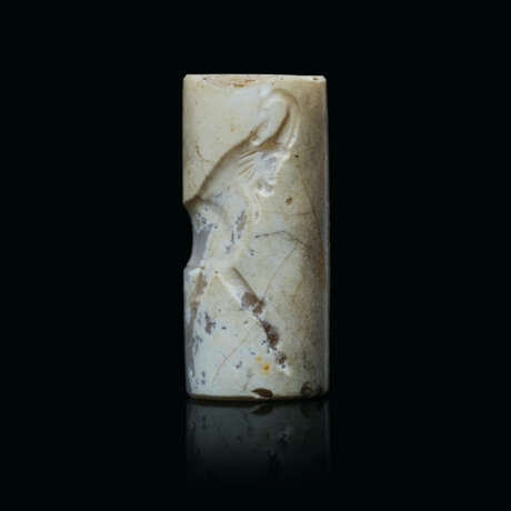 A GRECO-PERSIAN CALCIFIED CHALCEDONY CYLINDER SEAL WITH A GOAT - фото 1
