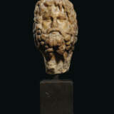 A ROMAN MARBLE HEAD OF ZEUS SERAPIS - photo 1