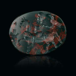 A ROMAN MAGICAL BLOODSTONE RINGSTONE WITH A HORSEMAN AND BIRD
