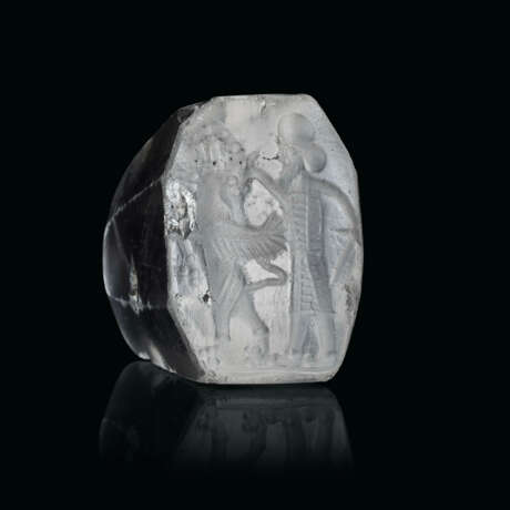 A GRECO-PERSIAN ROCK CRYSTAL PYRAMIDAL STAMP SEAL WITH A HERO AND WINGED GOAT - фото 1