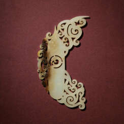 A LARGE WHITE JADE RETICULATED ‘PHOENIX’ PLAQUE