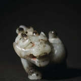 AN EXCEEDINGLY RARE AND EXCEPTIONAL JADE CARVING OF A MYTHICAL BEAST, BIXIE - photo 2
