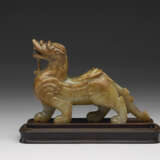 AN EXCEEDINGLY RARE AND EXCEPTIONAL JADE CARVING OF A MYTHICAL BEAST, BIXIE - photo 7