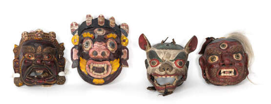 Vier dämonische, polychrom bemalte Holz- und Pappmaché-Masken - Foto 1