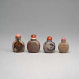 Vier Snuffbottles aus Achat und anderem Stein - photo 1