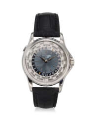 PATEK PHILIPPE, REF. 5110P-001, A VERY FINE PLATINUM WORLD TIME WRISTWATCH WITH BLUE DIAL