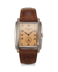 PATEK PHILIPPE, REF. 5124G-001, GONDOLO, A FINE 18K WHITE GOLD RECTANGULAR-SHAPED WRISTWATCH WITH SUBSIDIARY SECONDS