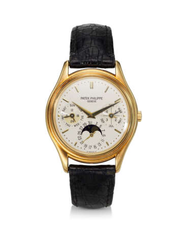 PATEK PHILIPPE, REF. 3940, A VERY FINE 18K YELLOW GOLD PERPETUAL CALENDAR WRISTWATCH WITH MOON PHASES AND 24 HOUR INDICATOR - фото 1