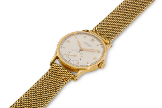 PATEK PHILIPPE, REF. 570, CALATRAVA, A FINE 18K YELLOW GOLD WRISTWATCH WITH SUBSIDIARY SECONDS ON GAY FRERES BRACELET - Foto 3