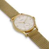 PATEK PHILIPPE, REF. 570, CALATRAVA, A FINE 18K YELLOW GOLD WRISTWATCH WITH SUBSIDIARY SECONDS ON GAY FRERES BRACELET - Foto 5