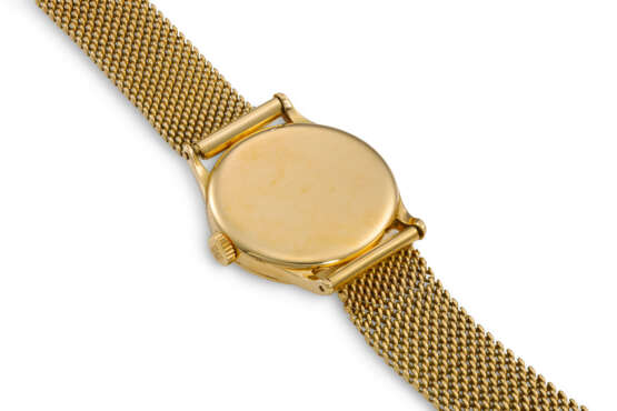PATEK PHILIPPE, REF. 570, CALATRAVA, A FINE 18K YELLOW GOLD WRISTWATCH WITH SUBSIDIARY SECONDS ON GAY FRERES BRACELET - Foto 8