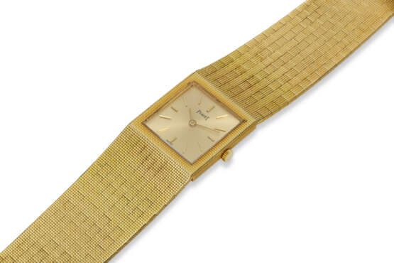 PIAGET, REF. 9131 C4, A VERY FINE 18K YELLOW GOLD BRACELET WATCH, BELONGING TO JOHNNY CASH'S TALENT MANAGER, SAUL HOLIFF - Foto 2