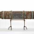 Casket of cylindrical shape composed of a central opening sector in grooved wood and two lateral sectors covered in brocade fabric - Auction archive