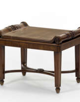Solid carved wood stool, legs joined by curvilinear crosspieces joined by caster