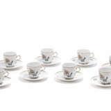Coffee service consisting of eight cups with saucers, in polychrome painted porcelain with floral motifs - photo 1