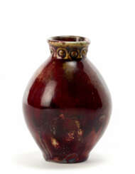 Glazed ceramic vase with red, green and beige drippings