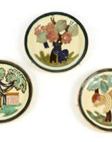 Three polychrome glazed earthenware plates engraved with naturalistic motifs