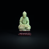 A PALE GREENISH-WHITE JADE SEATED FIGURE OF BUDDHA - photo 1