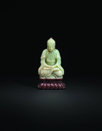 A PALE GREENISH-WHITE JADE SEATED FIGURE OF BUDDHA - photo 1