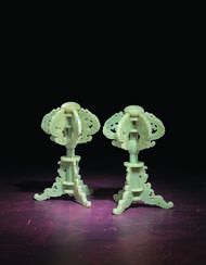 AN IMPERIAL AND EXCEPTIONALLY RARE PAIR OF GREENISH-WHITE JADE RETICULATED HAT STANDS