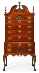 A CHIPPENDALE CARVED MAHOGANY HIGH CHEST-OF-DRAWERS