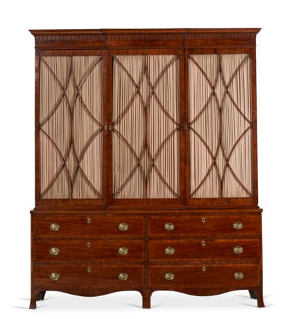 A FEDERAL MAHOGANY VENEERED AND INLAID LIBRARY BREAKFRONT BOOKCASE - photo 1